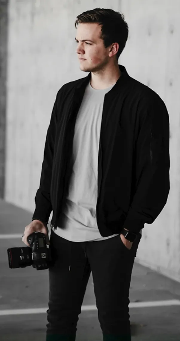 Wedding videographer holding a camera